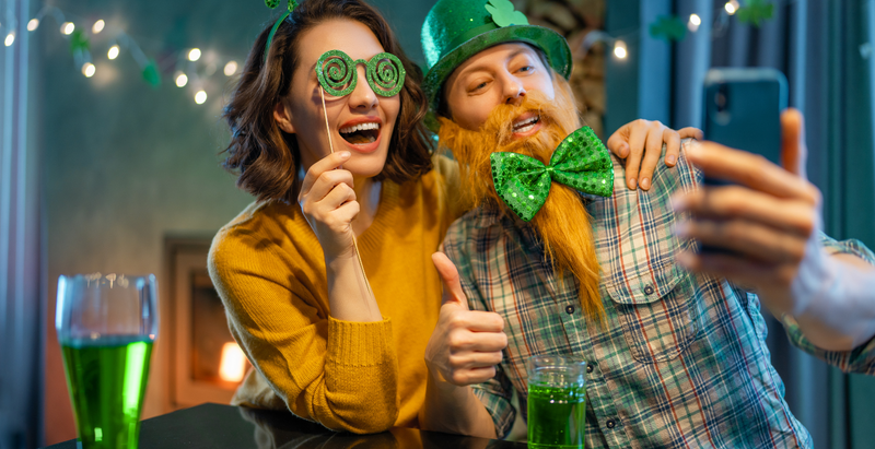 What do people traditionally wear green on St Patricks day to avoid?